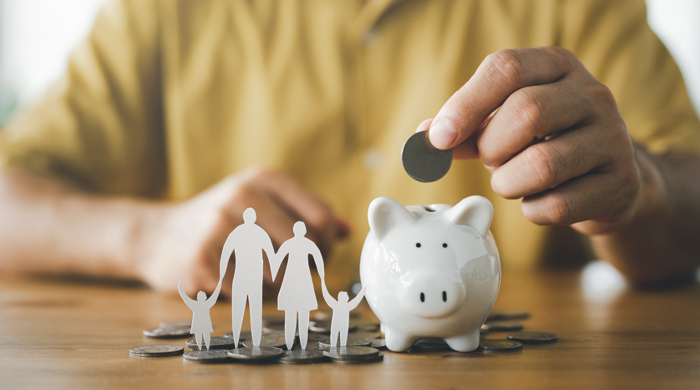 Family savings represented with a piggy bank and coins